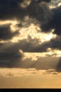 Shafts of sunlight over wind farm at sea Royalty Free Stock Photo