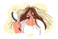 Shaggy woman is holding comb and laughing, seeing electrified hair sticking out in directions