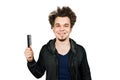 Shaggy young man with long haird holding comb, Isolated on white background