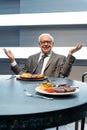 Warren Buffett\'s wax figure displayed at Red Carpet 2 in I-City Shah Alam