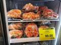 Shah Alam, Malaysia - 7 May 2021 : View a frozen Alaska King Crab Whole for sell inside refrigerator in supermarket