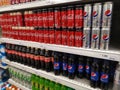SHAH ALAM, MALAYSIA - 18 September 2020 : Assorted a Pepsi and Coca Cola soft drink can and bottle for sell in the supermarket