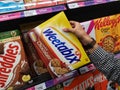 SHAH ALAM, MALAYSIA - 18 September 2020 : Hand hold a boxed of WEETABIX with chocolate cereal for sell in the supermarket.