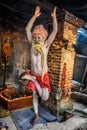 Shaiva sadhu (holy man) exercises in Pashupatinath Temple, Kath Royalty Free Stock Photo