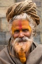 Shaiva sadhu smiling and posing on the street