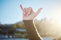 Shaka, hand sign and surfer outdoor in nature on an adventure or holiday in summer in hawaii. Chill out gesture Royalty Free Stock Photo