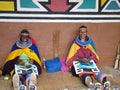 SHAKALAND, SOUTH AFRICA - CIRCA NOVEMBER 2011 :Unidentified Zulu women make traditional Zulu bead jewelry