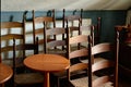 Shaker chairs and tables gathered in a group