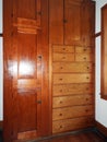 Shaker Village handcrafted wall bureau and wardrobe Royalty Free Stock Photo
