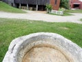 Shaker Vintage round granite watering trough Royalty Free Stock Photo