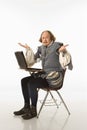 Shakespeare with laptop. Royalty Free Stock Photo