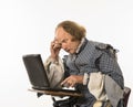 Shakespeare using laptop. Royalty Free Stock Photo