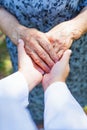 Shaking elderly hands Royalty Free Stock Photo