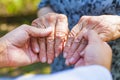 Shaking elderly hands Royalty Free Stock Photo