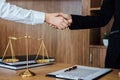 Shaking hands after good cooperation, Business woman handshake female lawyer after discussing good deal of contract, Meeting and Royalty Free Stock Photo