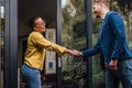 Shaking hands handshake greeting good old friend, client, job professional or new employee, two persons welcoming each other Royalty Free Stock Photo