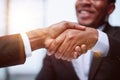 shaking hands with real estate agent in the office. Royalty Free Stock Photo