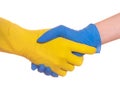 Shaking hands, safe contact. Two human palms in rubber protective gloves, close up, on white.