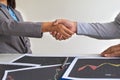 Shaking hands, A team of business executives are planning consultations about business investments related to shares. Royalty Free Stock Photo
