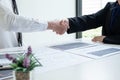 Shaking hands, A team of business executives are planning consultations about business investments related to shares. By analyzing Royalty Free Stock Photo
