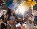 Shaking to the Brazilian beats. Shot of samba dancers performing in a carnival. Royalty Free Stock Photo