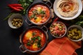 Shakshouka, eggs poached in sauce of tomatoes, olive oil, peppers, onion and garlic Royalty Free Stock Photo