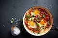 Shakshouka Eggs poached eggs in a spicy tomato sauce Royalty Free Stock Photo