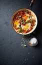 Shakshouka Eggs poached eggs in a spicy tomato sauce