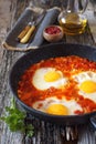 Shakshouka: fried eggs with tomatoes and peppers