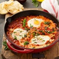 Shakshuka with chickpeas in a skillet