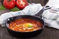 Shakshuka with tomatoes and eggs