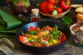 Shakshuka is a traditional breakfast of Israeli cuisine. Eggs fr Royalty Free Stock Photo