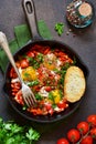 Shakshuka is a traditional breakfast of Israeli cuisine. Eggs fr