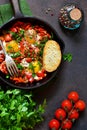 Shakshuka is a traditional breakfast of Israeli cuisine. Eggs fr Royalty Free Stock Photo