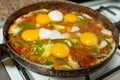 Shakshuka traditional dish in frying pan, close up Royalty Free Stock Photo