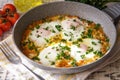 Shakshuka - traditional dish of israeli cuisine in a skillet Royalty Free Stock Photo