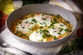 Shakshuka - traditional dish of israeli cuisine in a skillet Royalty Free Stock Photo