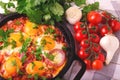 Shakshuka. Traditional Israeli cuisine. Fried eggs with vegetables Royalty Free Stock Photo