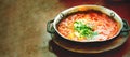 Shakshuka. Traditional jewish food and middle eastern cuisine recipe. Fried eggs, tomatoes, bell pepper and parsley in a