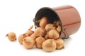 Shallots in a brown enamel cooking pot Royalty Free Stock Photo