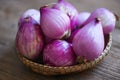 Shallots or red onion, purple shallots on basket , fresh shallot for medicinal products or herbs and spices Thai food made from