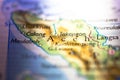 Shallow depth of field focus on geographical map location of Aceh city in Sumatra island Indonesia Asia continent on atlas