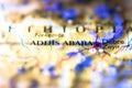 Shallow depth of field focus on geographical map location of Addis Ababa Abeba Finfinne city in Ethiopia Arab Africa continent on