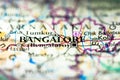 Shallow depth of field focus on geographical map location of Bangalore Bengaluru city in Karnataka India Asia continent on atlas