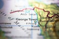 Shallow depth of field focus on geographical map location of Georgetown city in Penang island Malaysia Asia continent on atlas