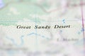 Shallow depth of field focus on geographical map location of Great Sandy Desert Australia Oceania continent on atlas Royalty Free Stock Photo