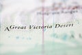 Shallow depth of field focus on geographical map location of Great Victoria Desert Australia Oceania continent on atlas Royalty Free Stock Photo