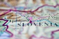 Shallow depth of field focus on geographical map location of Ljubljana city Slovenia Europe continent on atlas Royalty Free Stock Photo