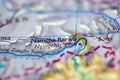 Shallow depth of field focus on geographical map location of Mount Namcha Barwa in China Asia continent on atlas Royalty Free Stock Photo