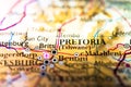 Shallow depth of field focus on geographical map location of Pretoria city in South Africa Africa continent on atlas